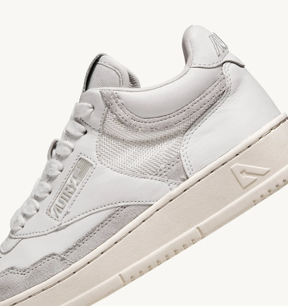 AUTRY Open Mid Sneaker In Pelle E Suede Colore Bianco